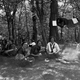 Minnesota girl scouts sitting around a campfire